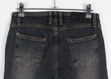 CURVED SLIM BOOTS CUT DENIM