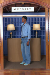 WASHING CURVED WIDE DENIM PANTS LIGHT BLUE