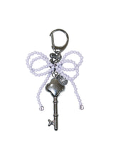 [OBJET] Loveseal double bow keyring
