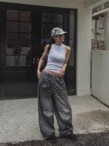 ヒドゥンストリングエンボコーテッドオイルデニムパンツ