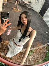 Center ribbon slit sleeveless top