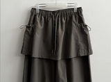 Log banding layered pocket skirt pants