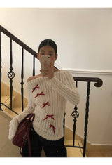 Red bow off-shoulder long-sleeved knitwear