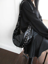 multi eyelet cross bag