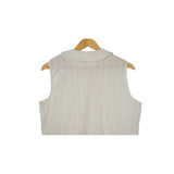 burring sleeveless blouse