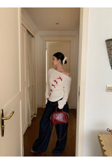 Red bow off-shoulder long-sleeved knitwear