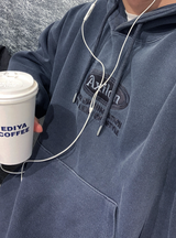トラビスエクシロンエンンブロイダードコットンピグメントオーバーフィットフーディ