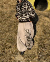 Poki Big Wide Lettering Sweat Pants