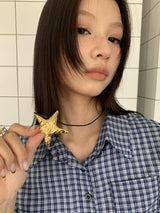 Vintage gold spiral star necklace