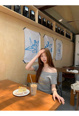 イエロークリームオフショルダーショートスリーブニットTシャツ