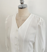 Lua V-neck Peplum Three Quarter Blouse