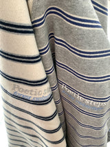 a light striped sweatshirt, grey