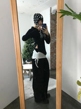 斜めボタンタートルネックニット