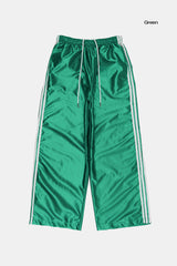 Bright glossy track pants