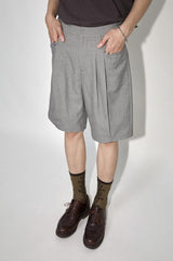 Wool blend short pants with pleated and segmented flat pocket design