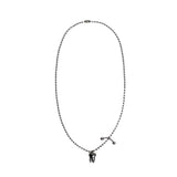 tooth piercing necklace