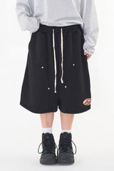 Pain patch bermuda pants