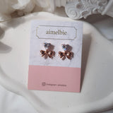[CHUU Piercing] Heart Crystal and Ribbon Piercing - Rosegold