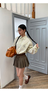 a forsythia striped loose-fit shirt