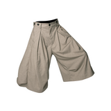 RELABEL Element of Time (cont'd) Horizontal and vertical pleats, elegantly draped silhouette, 8-minute trousers