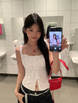 ホワイトスマイルスリーブレスブラウス