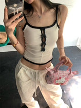 Center ribbon slit sleeveless top