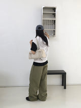 The New Byul two-way hooded vest zip-up