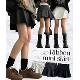Torom Back Banded Ribbon Slit Flare Mini Skirt