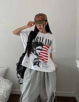 Land semi-crop over short sleeves