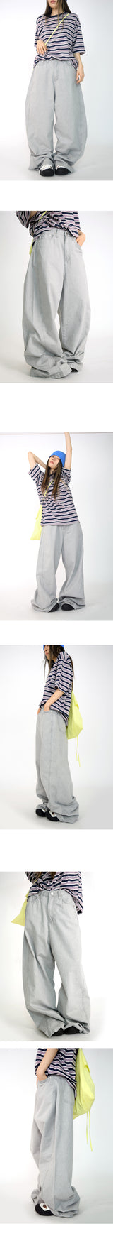 over wide gray pants
