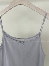 a ribbon-punching sleeveless shirt