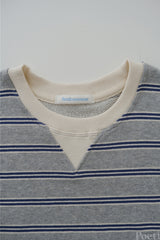 a light striped sweatshirt, grey