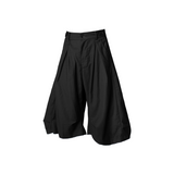 RELABEL Element of Time (cont'd) Horizontal and vertical pleats, elegantly draped silhouette, 8-minute trousers