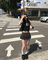 Check pleated skirt
