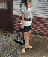 a raw paper stitch jean skirt