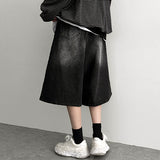 A.D washing side pintuck over wide denim shorts