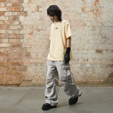 RELABEL 24SS ‘Auxiliary Graphic’ スプリットロゴプリントアプリコットTシャツ