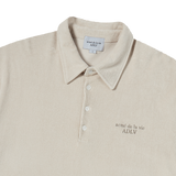 25SS TERRY LOGO EMBO SHORT SLEEVE COLLAR T-SHIRT LIGHT BEIGE