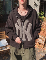 [Lining brushed] Curie New York Patch Damage Hood Zip-up