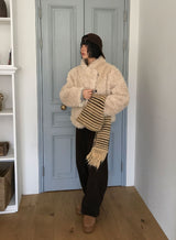 ダイアゴナルボタンファージャケット