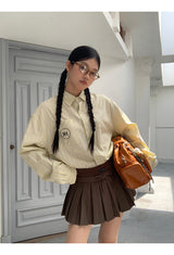 a forsythia striped loose-fit shirt