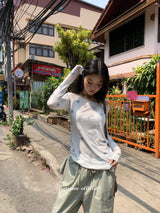 Item Span off shoulder long sleeve tee