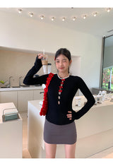 Red bow slit long-sleeved knit shirt