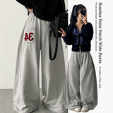 Muit Side Pintuck Back Pocket Number Patch Training Wide Pants