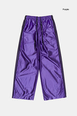 Bright glossy track pants