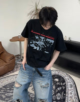 サエルグラフィッククロップ半袖Tシャツ