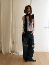 Dirty washed destroyed denim pants