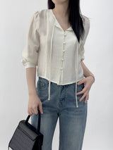 Leche Strap Button Long Sleeve Blouse