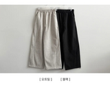 メンデ カーブド インシジョン ウール ワイドパンツ