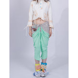 light green pleated pants
